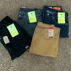 Levi’s performance 514 Straight stretch. 31 x 32. Sold as a bundle of 4 pants.